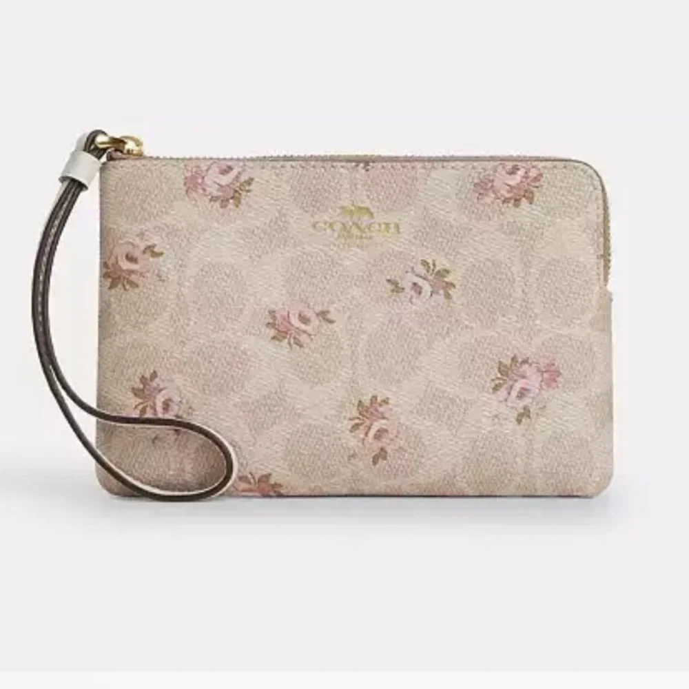 Coach Corner Zip Wristlet
In Signature Canvas With Floral Print NWT - Picture 1 of 5